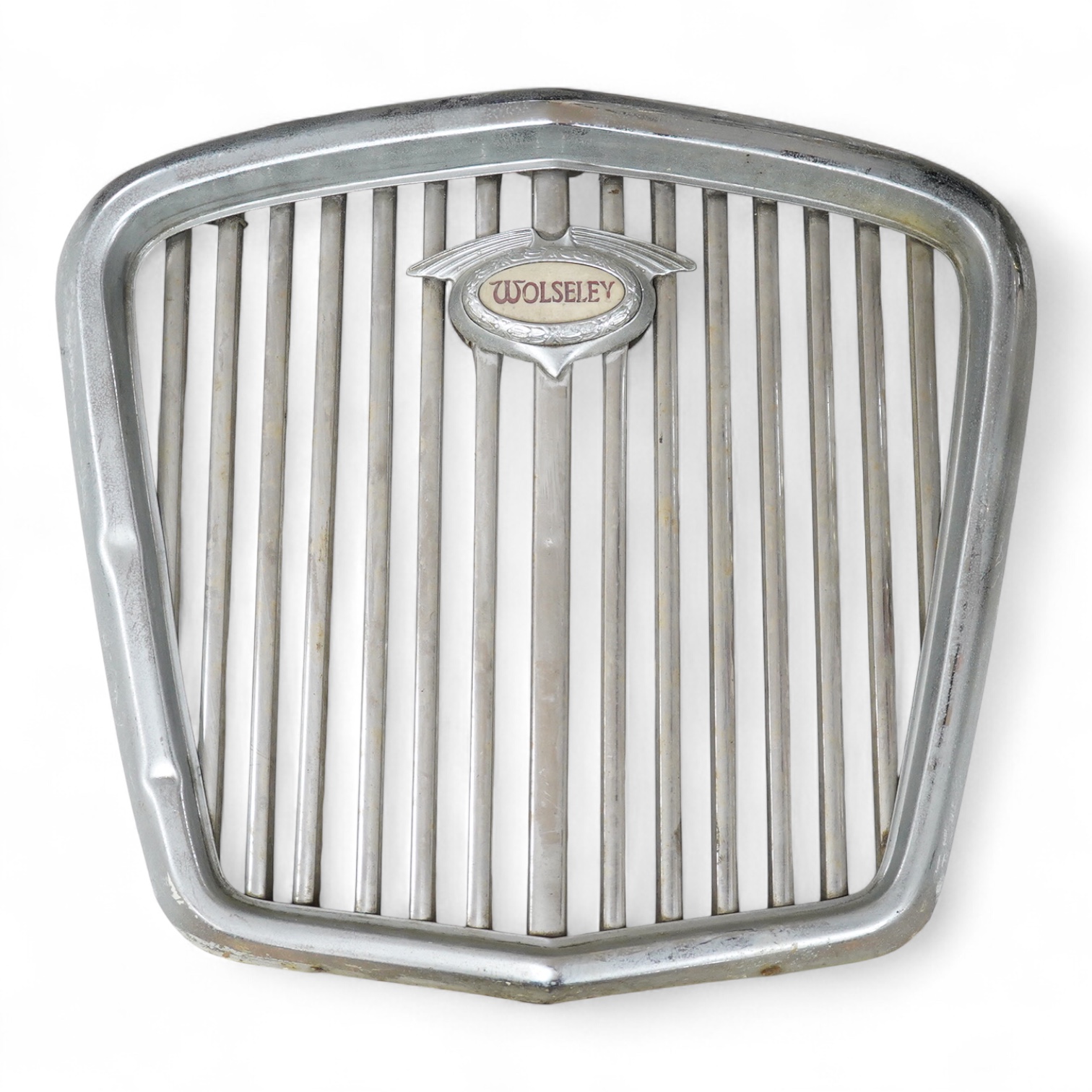 A 1950s Wolseley automobile radiator grill, with a lit logo to the centre of the grill, 40cm x 43cm